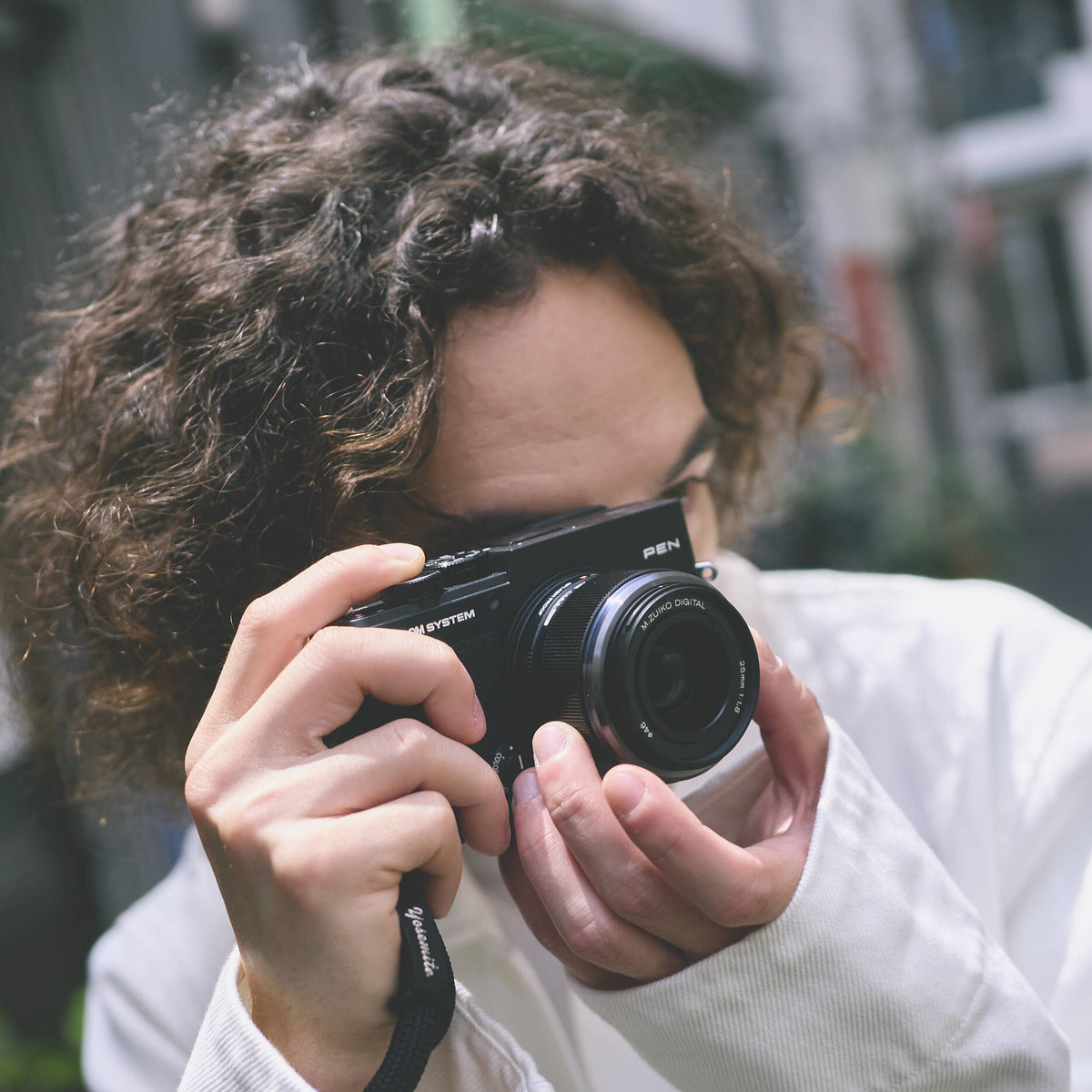 OM SYSTEM PEN compact Micro Four Thirds mirrorless camera
