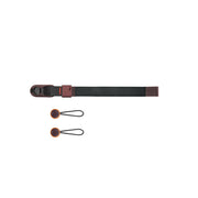 Keep your camera secure with the Peak Design Cuff Wrist Strap, featuring a durable nylon and leather build, adjustable fit and strong anchor links.