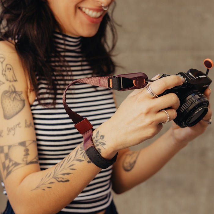 Keep your camera secure with the Peak Design Cuff Wrist Strap, featuring a durable nylon and leather build, adjustable fit and strong anchor links.