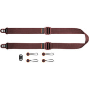 Versatile camera strap in Eclipse Purple with quick-release anchors, adjustable 99–145 cm length and 90.7 kg capacity for secure, comfortable carry.
