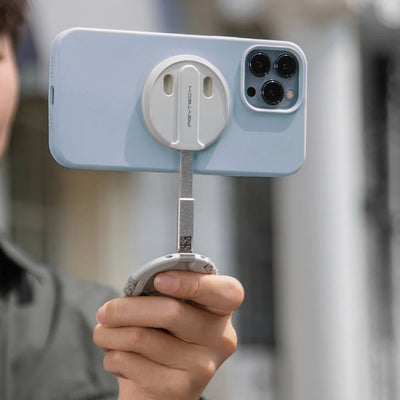 PGYTECH MagFlex Phone Photography Stand in grey with 6.1mm slim design, strong magnetic ring compatible with MagSafe, infinite rotating shaft, and extendable handle for versatile phone positioning.