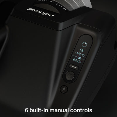 Polaroid I-2 Instant Camera with 98mm f/8 lens, LiDAR autofocus, manual and auto exposure modes, built-in flash, Bluetooth remote control, optical viewfinder with LCD info display, rechargeable battery, and robust aluminum alloy body.