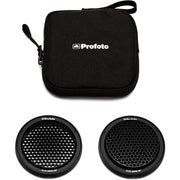 Black camera lens with grid pattern and Profoto case on a white background