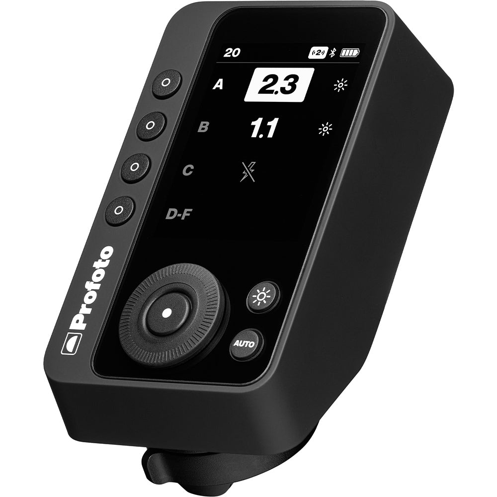 Black camera remote control with digital display on a white background