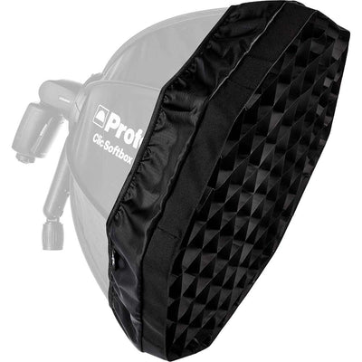 Black softbox with honeycomb grid attached to a light source on a white background