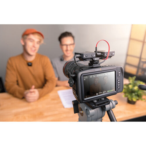 Conveniently attach two cold shoe equipped devices to one camera; the ideal accessory for videographers and filmmakers.