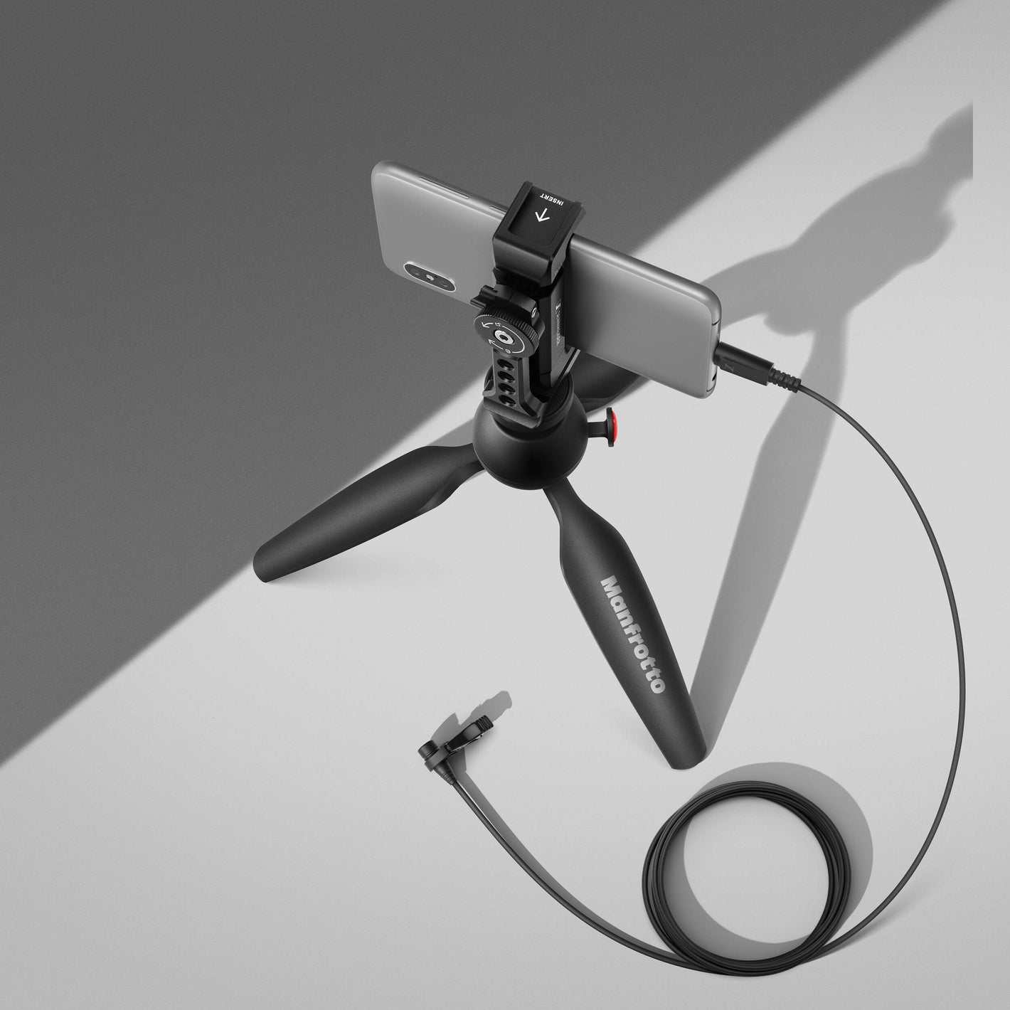 Sennheiser XS Lav USB-C Mobile Kit including omnidirectional clip-on condenser microphone with 2m cable, USB-C connector, high-quality natural sound, smartphone clamp with cold shoe mount, and Manfrotto PIXI mini tripod for versatile mobile content creation.