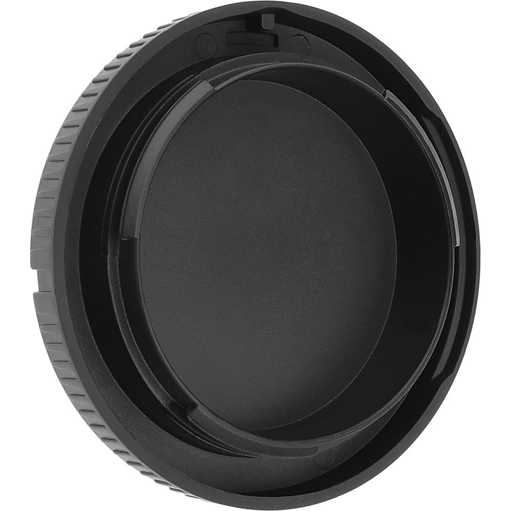 Black Sony camera body cap on a white background