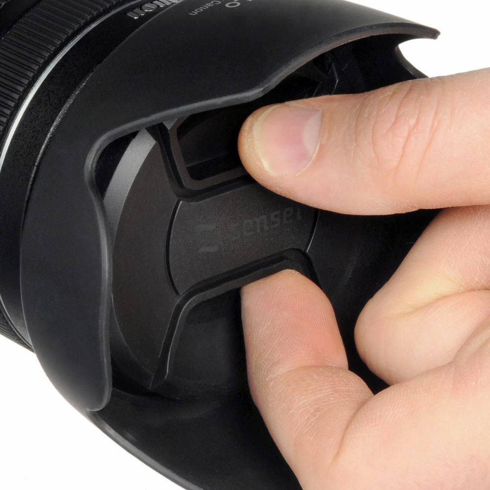 Sensei 55mm centre-pinch snap-on lens cap being pinched