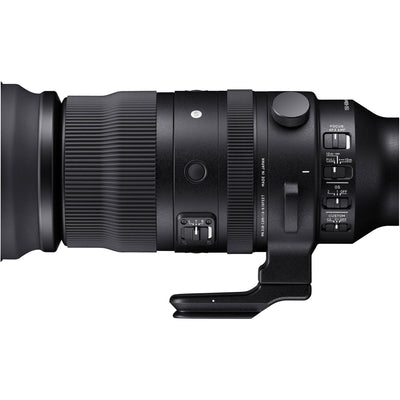 Close-up of a camera lens with control buttons on a white background