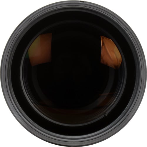 Close-up of a camera lens on a white background