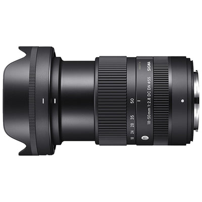 Camera lens with brand name on a white background