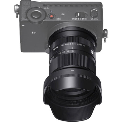 Camera with lens on a white background