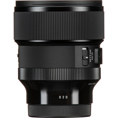 Black camera lens on a white background