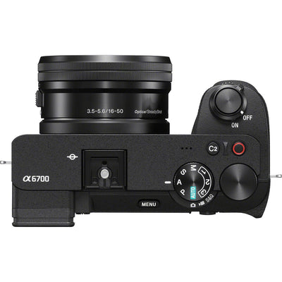 Black Sony camera with lens on a white background