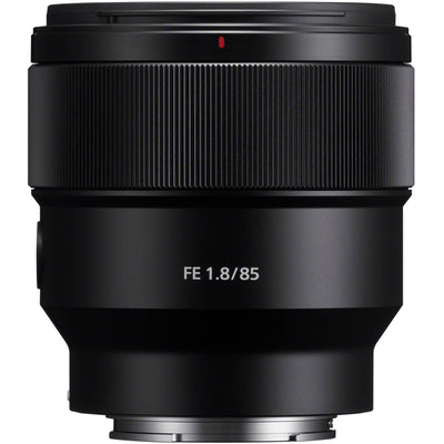 Black camera lens with 'FE 1.8/85' text on a white background
