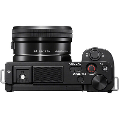 Black camera lens and control panel on a white background