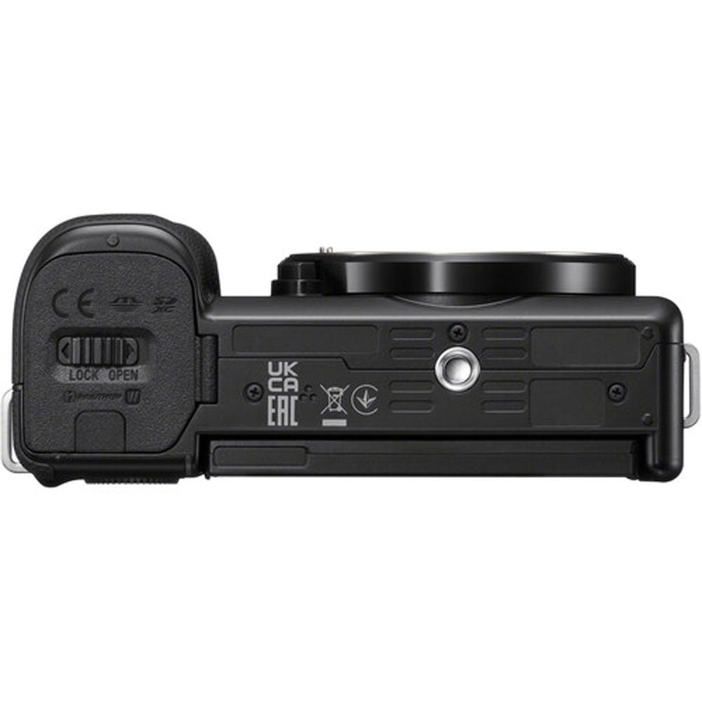 Black camera battery grip on a white background