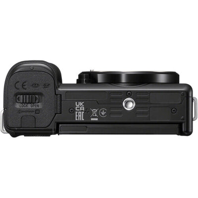 Black camera battery grip on a white background