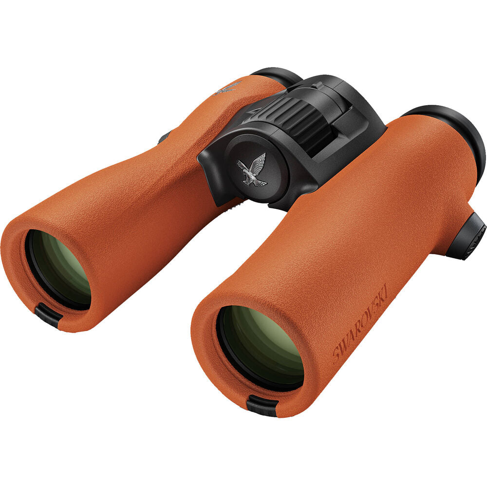Swarovski 8x32 NL Pure Binoculars in Burnt Orange sports an ultra-wide field of view and long eye relief all in a compact magnesium housing.