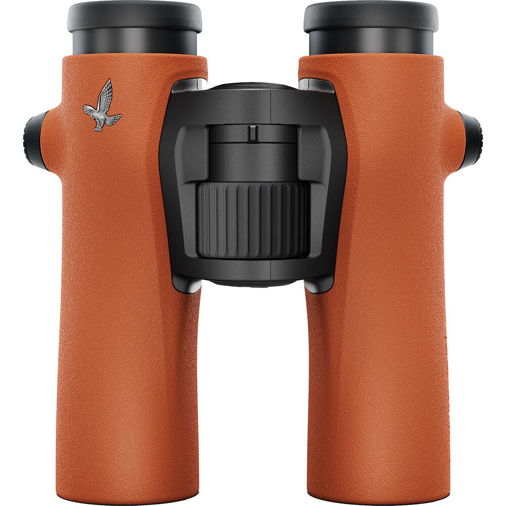 Swarovski 8x32 NL Pure Binoculars in Burnt Orange sports an ultra-wide field of view and long eye relief all in a compact magnesium housing.