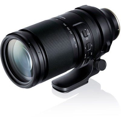 Camera lens with focus ring and control buttons on a white background