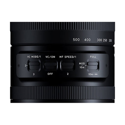 Black camera lens with control buttons on a white background