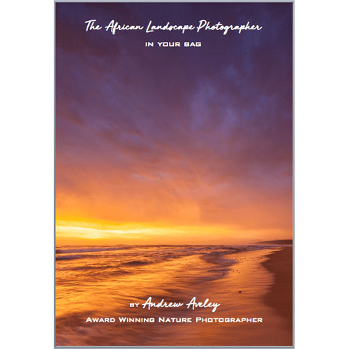 Book cover with sunset over water and text about African landscape photography by Andrew Avey.
