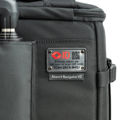 Think Tank Airport Navigator V2 rolling camera bag with laptop compartment and adjustable dividers.