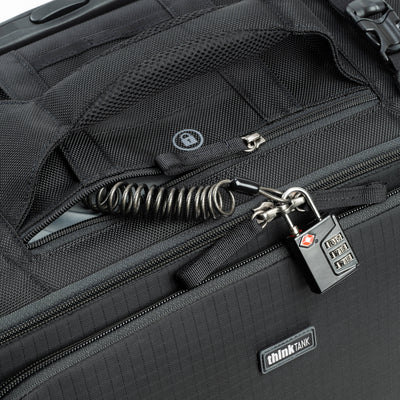 Think Tank Airport Navigator V2 rolling camera bag with laptop compartment and adjustable dividers.