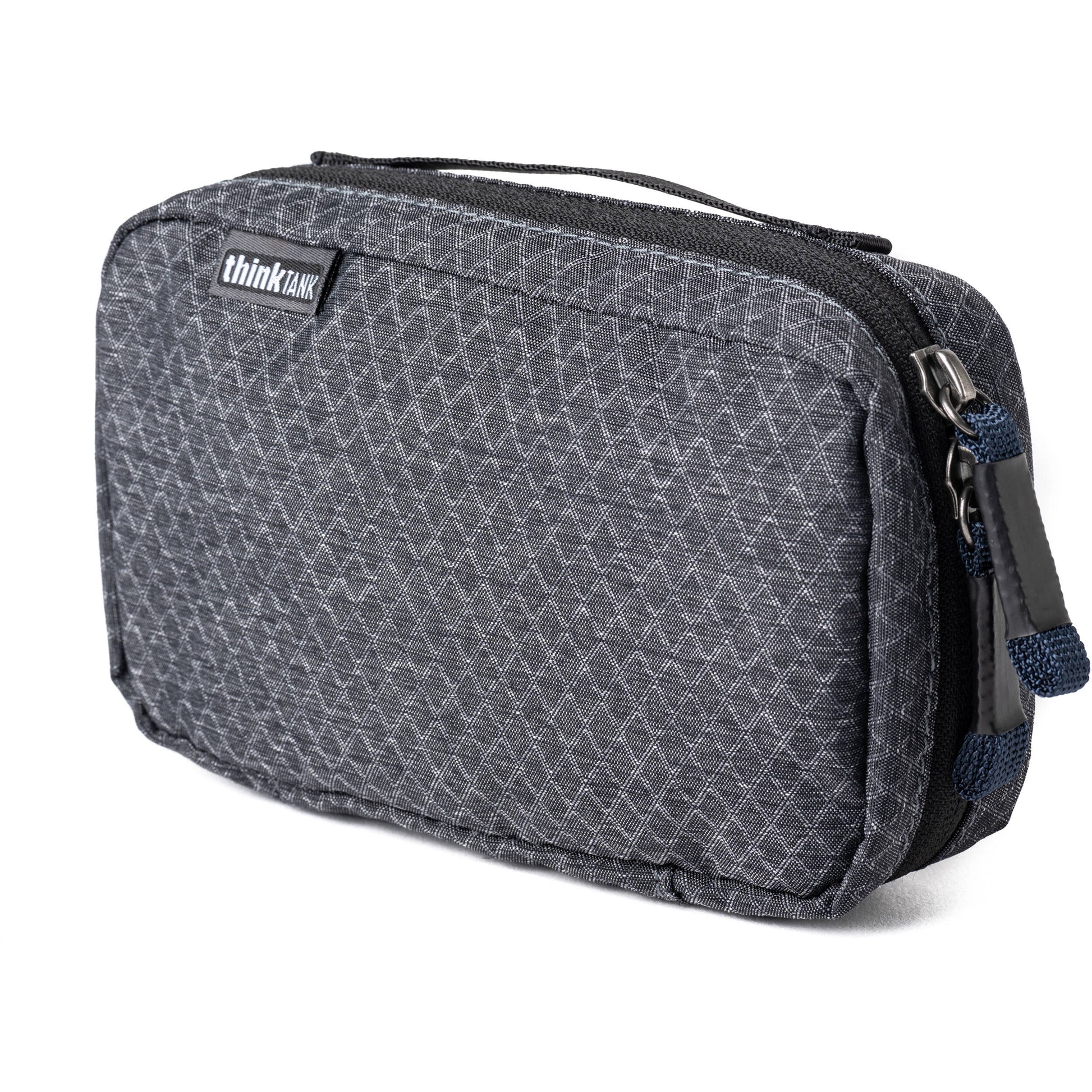 Think Tank EDC Pouch with pockets, zippered compartment, water-repellent coating, and open-flat design for easy access.
