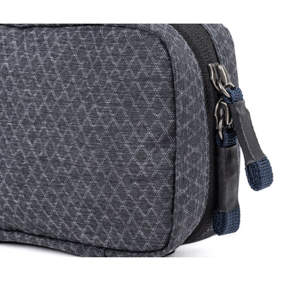 Think Tank EDC Pouch with pockets, zippered compartment, water-repellent coating, and open-flat design for easy access.