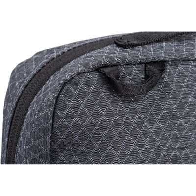 Think Tank EDC Pouch with pockets, zippered compartment, water-repellent coating, and open-flat design for easy access.