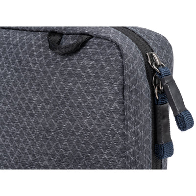 Think Tank EDC Pouch with pockets, zippered compartment, water-repellent coating, and open-flat design for easy access.