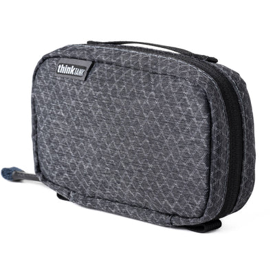 Think Tank EDC Pouch with pockets, zippered compartment, water-repellent coating, and open-flat design for easy access.