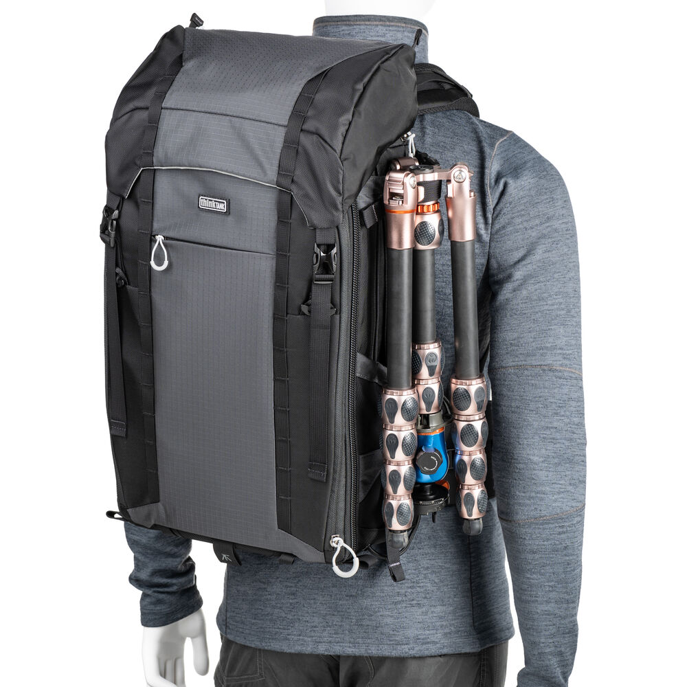 Versatile backpack with expandable pockets for outdoor photographers.
