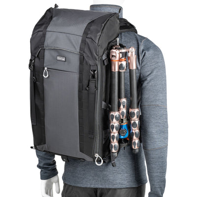 Versatile backpack with expandable pockets for outdoor photographers.