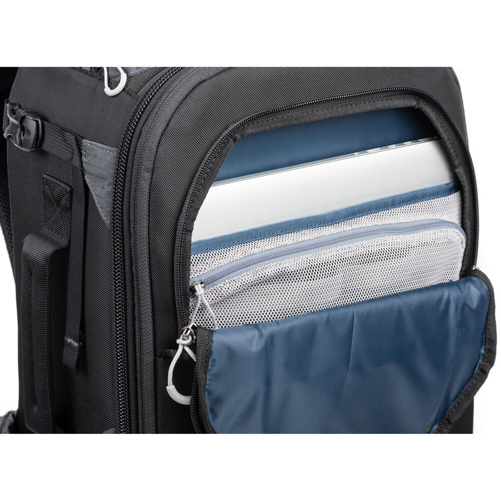 Versatile backpack with expandable pockets for outdoor photographers.