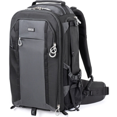Versatile backpack with expandable pockets for outdoor photographers.