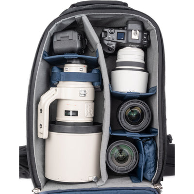 FirstLight 46L+ camera backpack with expandable front pocket.
