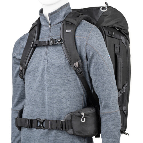 FirstLight 46L+ camera backpack with expandable front pocket.