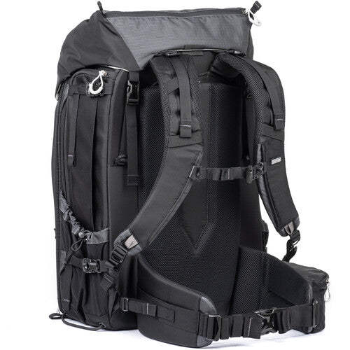 FirstLight 46L+ camera backpack with expandable front pocket.
