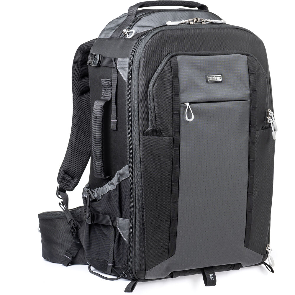 FirstLight 46L+ camera backpack with expandable front pocket.