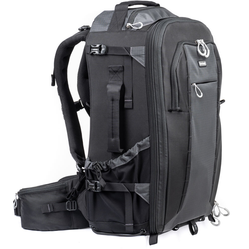 FirstLight 46L+ camera backpack with expandable front pocket.