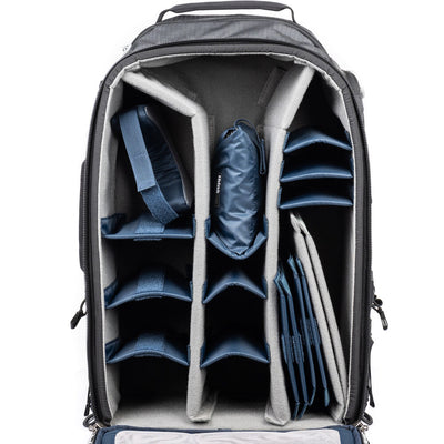 FirstLight 46L+ camera backpack with expandable front pocket.
