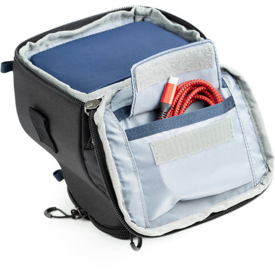 Think Tank mirrorless camera holster with accessory pockets
