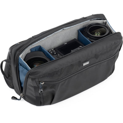 PressPass Sling Bag with removable insert, grab handle, and rain cover for easy camera access.
