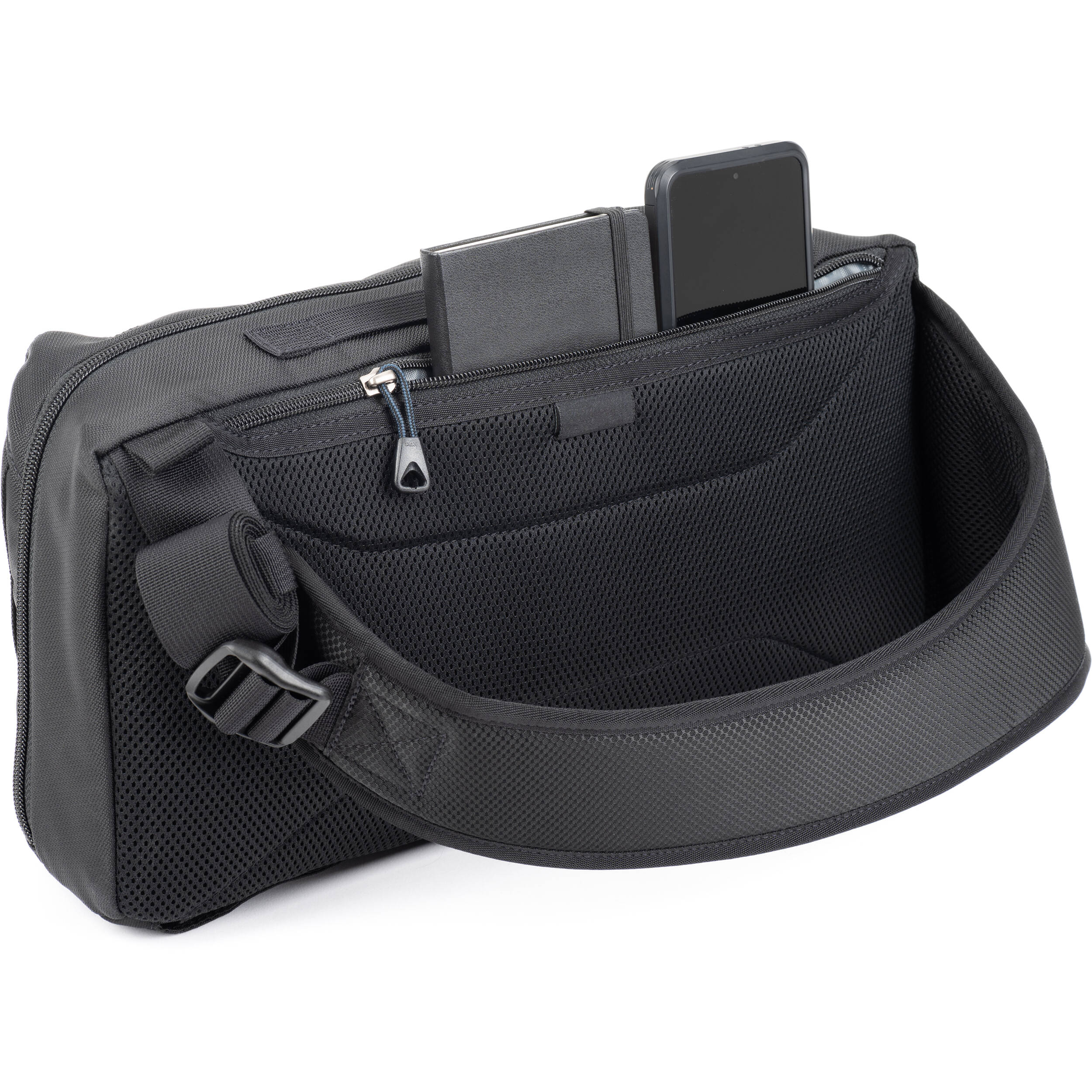 PressPass Sling Bag with removable insert, grab handle, and rain cover for easy camera access.