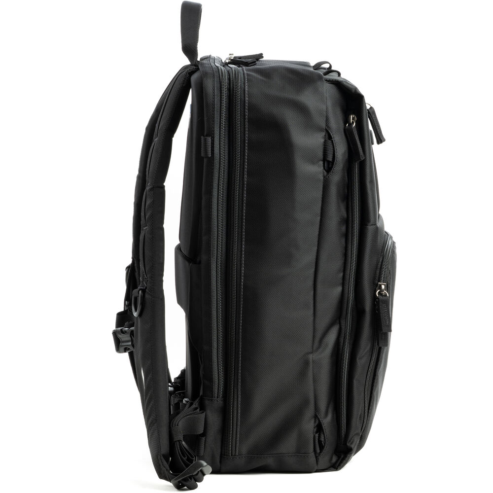 Versatile camera backpack with quick access and expandable storage