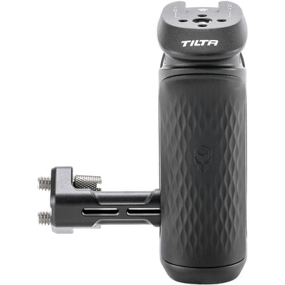 Tilta Xeno Side Handle with dual 1/4"-20 screw mount in black, featuring an ergonomic non-slip silicone grip and a cold shoe receiver for camera cage mounting.